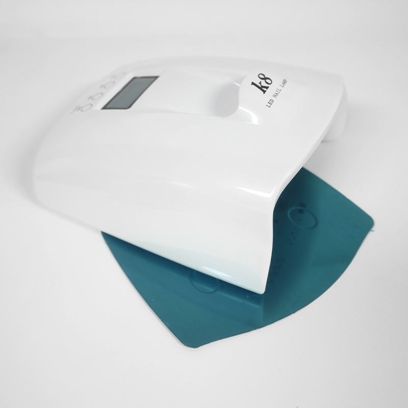 Nail lamp with handle and base plate